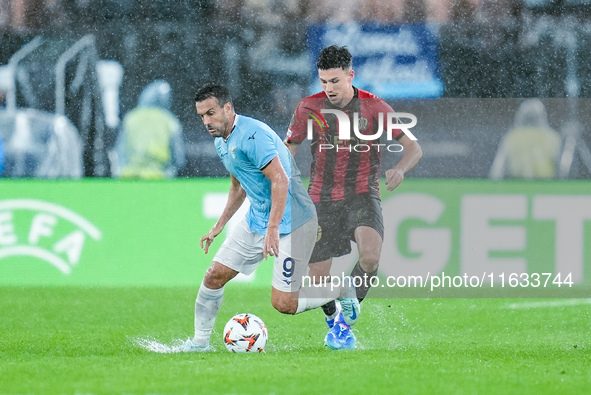 Tom Louchet of OGC Nice and Pedro of SS Lazio compete for the ball during the UEFA Europa League 2024/25 League Phase MD2 match between SS L...