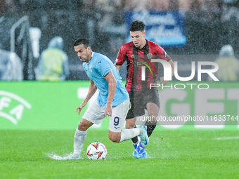 Tom Louchet of OGC Nice and Pedro of SS Lazio compete for the ball during the UEFA Europa League 2024/25 League Phase MD2 match between SS L...