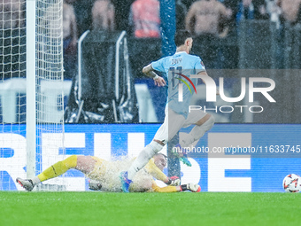 Marcin Bulka of OGC Nice commits a penalty kick foul on Taty Castellanos of SS Lazio during the UEFA Europa League 2024/25 League Phase MD2...