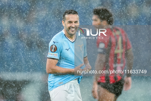 Pedro of SS Lazio wrings out his rain-soaked shirt during the UEFA Europa League 2024/25 League Phase MD2 match between SS Lazio and OGC Nic...