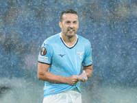 Pedro of SS Lazio wrings out his rain-soaked shirt during the UEFA Europa League 2024/25 League Phase MD2 match between SS Lazio and OGC Nic...