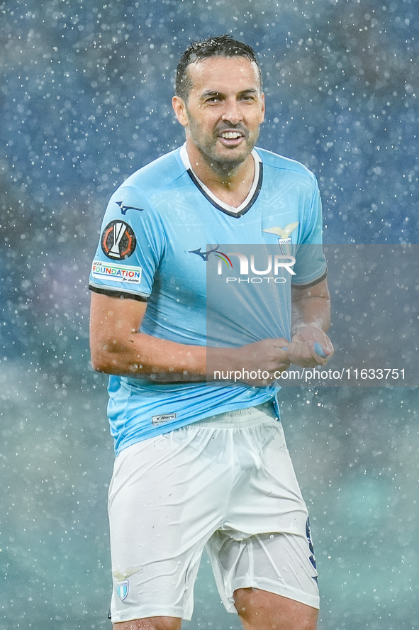 Pedro of SS Lazio wrings out his rain-soaked shirt during the UEFA Europa League 2024/25 League Phase MD2 match between SS Lazio and OGC Nic...