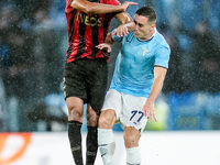 Ali Abdi of OGC Nice and Adam Marusic of SS Lazio jump for the ball during the UEFA Europa League 2024/25 League Phase MD2 match between SS...