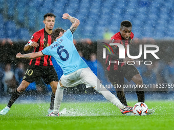 Nicolo' Rovella of SS Lazio and Youssoufa Moukoko of OGC Nice compete for the ball during the UEFA Europa League 2024/25 League Phase MD2 ma...