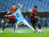 Nicolo' Rovella of SS Lazio and Youssoufa Moukoko of OGC Nice compete for the ball during the UEFA Europa League 2024/25 League Phase MD2 ma...