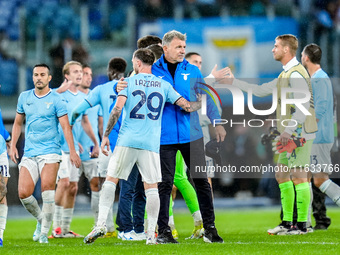 Marco Baroni head coach of SS Lazio celebrates the victory with Manuel Lazzari during the UEFA Europa League 2024/25 League Phase MD2 match...