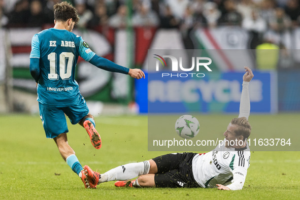 Abdessamad Ezzalzouli , Rafal Augustyniak  during UEFA Conference League match Legia Warsaw vs Real Betis in Warsaw Poland on 3 October 2024...