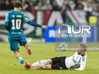 Abdessamad Ezzalzouli , Rafal Augustyniak  during UEFA Conference League match Legia Warsaw vs Real Betis in Warsaw Poland on 3 October 2024...