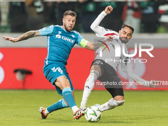 Aitor Ruibal , Luquinhas  during UEFA Conference League match Legia Warsaw vs Real Betis in Warsaw Poland on 3 October 2024. (