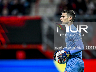 Fenerbahce goalkeeper Dominik Livakovic participates in the match between Twente and Fenerbahce at the Grolsch Veste for the UEFA Europa Lea...