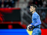 Fenerbahce goalkeeper Dominik Livakovic participates in the match between Twente and Fenerbahce at the Grolsch Veste for the UEFA Europa Lea...