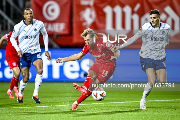 FC Twente midfielder Michel Vlap and Fenerbahce defender Mert Muldur play during the match between Twente and Fenerbahce at the Grolsch Vest...