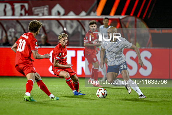 FC Twente midfielder Sem Steijn and Fenerbahce midfielder Sofyan Amrabat play during the match between Twente and Fenerbahce at the Grolsch...