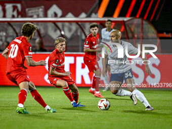 FC Twente midfielder Sem Steijn and Fenerbahce midfielder Sofyan Amrabat play during the match between Twente and Fenerbahce at the Grolsch...