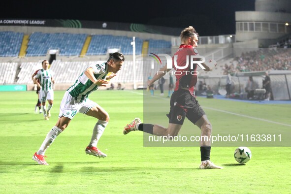 Gunnar Vatnhamar of Vikingur Reykjavik tries to kick the ball away in Nicosia, Cyprus, on October 3, 2024. Omonoia FC plays against Vikingur...