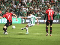 LOIZOS LOIZOU of Omonoia FC shoots the ball while GISLI GOTTSKALK THORDARSON and ARI SIGURPALSSON of Vikingur Reykjavik watch, in Nicosia, C...