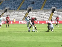 Dadi Berg Jonsson of Vikingur Reykjavik tries to dribble Senou Coulibaly of Omonoia FC in Nicosia, Cyprus, on October 3, 2024. Omonoia FC pl...