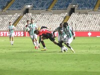 Dadi Berg Jonsson of Vikingur Reykjavik tries to dribble Alpha Diounkou of Omonoia FC in Nicosia, Cyprus, on October 3, 2024. Omonoia FC pla...