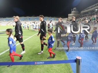 The teams enter the stadium in Nicosia, Cyprus, on October 3, 2024. Omonoia FC plays against Vikingur Reykjavik at GSP Stadium for the Leagu...