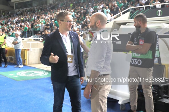 Omonoia manager Valdas Dambrauskas (L) and Vikingur Reykjavik manager Arnar Gunnlaugsson (R) are seen before the game in Nicosia, Cyprus, on...