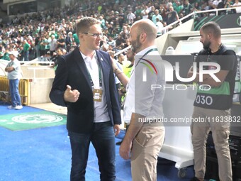 Omonoia manager Valdas Dambrauskas (L) and Vikingur Reykjavik manager Arnar Gunnlaugsson (R) are seen before the game in Nicosia, Cyprus, on...