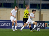 In Ta' Qali, Malta, on October 2, 2024, Kayden Farrugia of Valletta is challenged by Pietu Hautakanagas of Honka during the UEFA Youth Leagu...