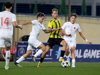 Kayden Farrugia of Valletta vies for the ball with Pietu Hautakanagas of Honka during the UEFA Youth League soccer match between Valletta an...