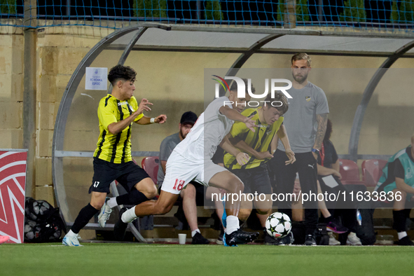 Keyon Ewurum of Valletta vies for the ball with Jouni Hamalainen of Honka during the UEFA Youth League soccer match between Valletta and Hon...