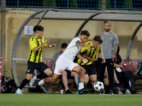 Keyon Ewurum of Valletta vies for the ball with Jouni Hamalainen of Honka during the UEFA Youth League soccer match between Valletta and Hon...