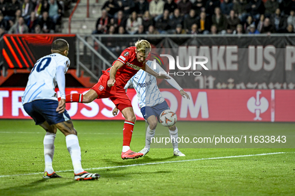 FC Twente midfielder Michel Vlap and Fenerbahce defender Mert Muldur play during the match between Twente and Fenerbahce at the Grolsch Vest...