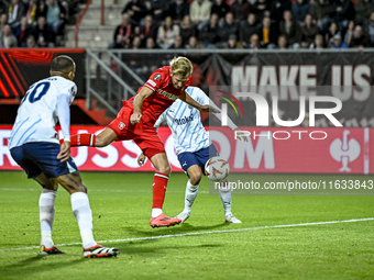 FC Twente midfielder Michel Vlap and Fenerbahce defender Mert Muldur play during the match between Twente and Fenerbahce at the Grolsch Vest...