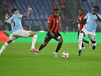 Matias Vecino of S.S. Lazio, Youssoufa Moukoko of O.G.C. Nice, and Loum Tchaouna of S.S. Lazio are in action during the UEFA Europa League 2...