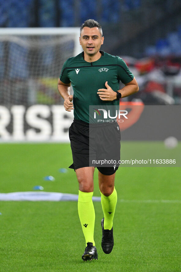 Referee Horatiu Fesnic (ROU) officiates the UEFA Europa League 2024/25 League Phase MD2 match between S.S. Lazio and O.G.C. Nice at Olympic...