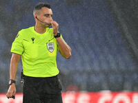 Referee Horatiu Fesnic (ROU) officiates the UEFA Europa League 2024/25 League Phase MD2 match between S.S. Lazio and O.G.C. Nice at Olympic...