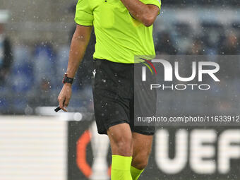 Referee Horatiu Fesnic (ROU) officiates the UEFA Europa League 2024/25 League Phase MD2 match between S.S. Lazio and O.G.C. Nice at Olympic...