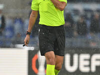 Referee Horatiu Fesnic (ROU) officiates the UEFA Europa League 2024/25 League Phase MD2 match between S.S. Lazio and O.G.C. Nice at Olympic...