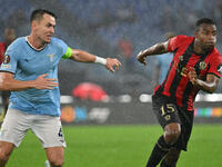 Patric of S.S. Lazio and Youssoufa Moukoko of O.G.C. Nice are in action during the UEFA Europa League 2024/25 League Phase MD2 match between...