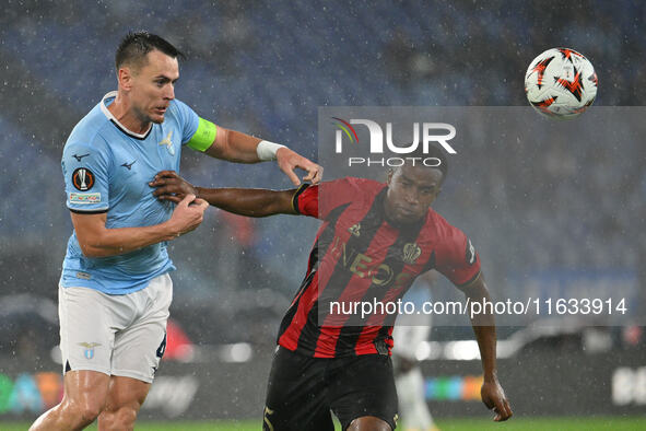 Patric of S.S. Lazio and Youssoufa Moukoko of O.G.C. Nice are in action during the UEFA Europa League 2024/25 League Phase MD2 match between...