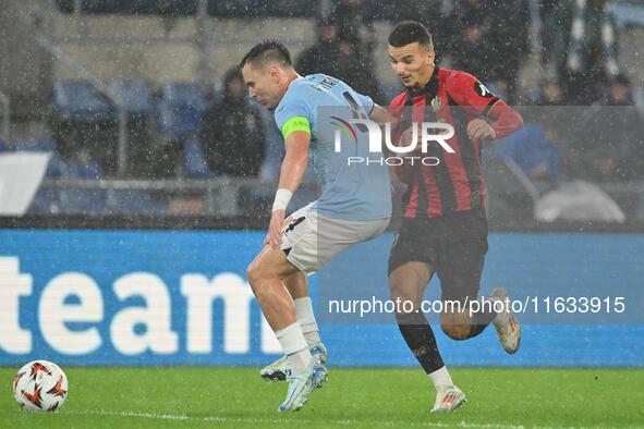 Patric of S.S. Lazio and Badredine Bouanani of O.G.C. Nice are in action during the UEFA Europa League 2024/25 League Phase MD2 match betwee...