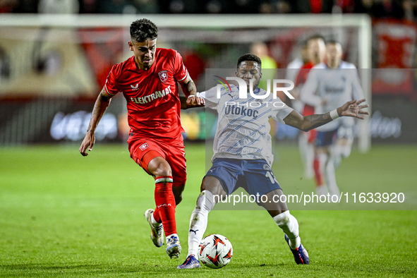 FC Twente defender Mees Hilgers and Fenerbahce midfielder Fred play during the match between Twente and Fenerbahce at the Grolsch Veste for...