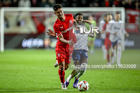 FC Twente defender Mees Hilgers and Fenerbahce midfielder Fred play during the match between Twente and Fenerbahce at the Grolsch Veste for...