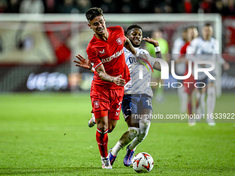 FC Twente defender Mees Hilgers and Fenerbahce midfielder Fred play during the match between Twente and Fenerbahce at the Grolsch Veste for...