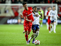 FC Twente defender Mees Hilgers and Fenerbahce midfielder Fred play during the match between Twente and Fenerbahce at the Grolsch Veste for...