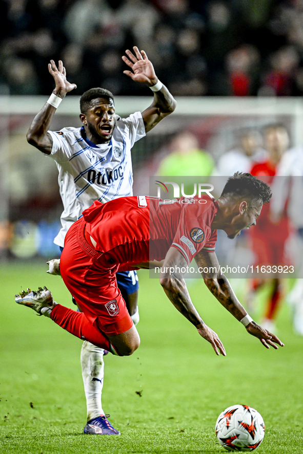 FC Twente defender Mees Hilgers and Fenerbahce midfielder Fred play during the match between Twente and Fenerbahce at the Grolsch Veste for...