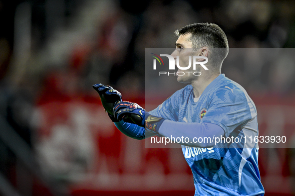 Fenerbahce goalkeeper Dominik Livakovic participates in the match between Twente and Fenerbahce at the Grolsch Veste for the UEFA Europa Lea...