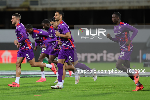 ACF Fiorentina players warm up before the match between the Conference League match between ACF Fiorentina and The New Saints, on October 3...