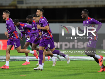 ACF Fiorentina players warm up before the match between the Conference League match between ACF Fiorentina and The New Saints, on October 3...