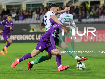 Lucas Beltran of ACF Fiorentina and Josh Pask of The New Saints ,battle for the ball during  the Conference League match between ACF Fiorent...