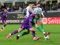 Lucas Beltran of ACF Fiorentina and Josh Pask of The New Saints ,battle for the ball during  the Conference League match between ACF Fiorent...