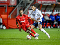 FC Twente defender Anass Salah-Eddine and Fenerbahce midfielder Irfan Can Kahveci play during the match between Twente and Fenerbahce at the...